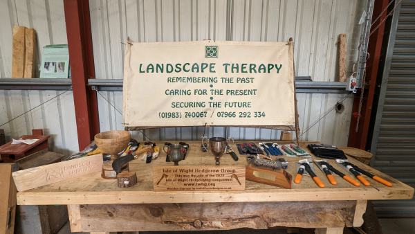 Winners get prizes from Landscape Therapy and other sponsors